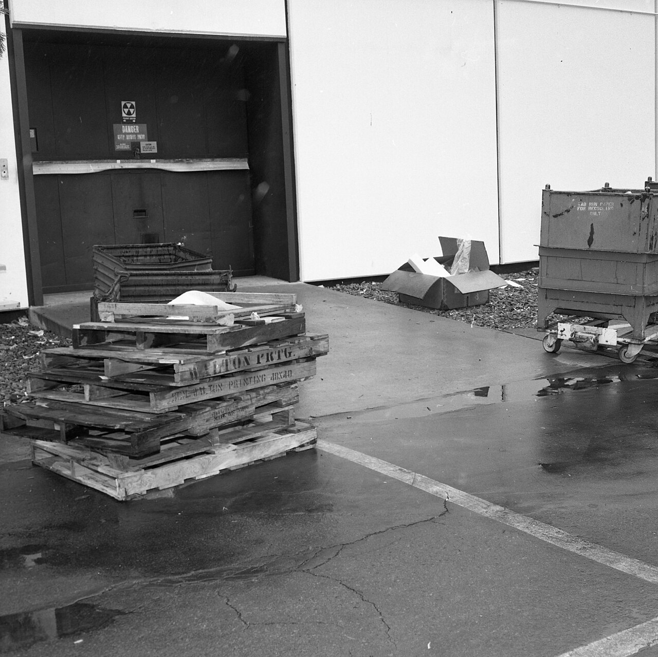 23 0068738 Convair Negative Image - Stacked wooden pallets (54202373235)